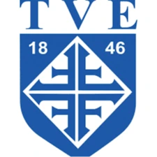 Blau-weißes TVE-Wappen mit Kreuzsymbol und den Zahlen 18 und 46